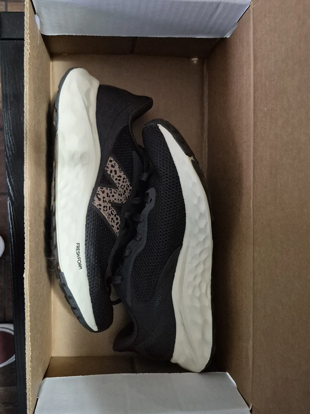 New Balance Women's Black Running Sneakers with Leopard Accent
